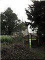 Looking from the cemetery gates across to St Mary Magdalene, Madehurst