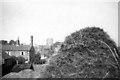 SP8181 : 1952 view of Rothwell Church and farmhouse from the farmyard by M J Richardson