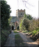 TF6204 : The driveway to St Mary's church in Wimbotsham by Evelyn Simak