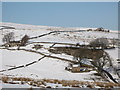 The snowy Swinhope Valley below Thorneyknowe Quarry