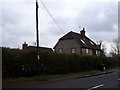 Burntwood Cottage alongside the Basingstoke Road (A33)