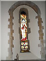 Stained glass windows  near the altar  at St James, Stedham