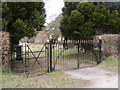 TM3569 : The Gates to Peasenhall Cemetery by Geographer