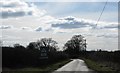 Clouds over the road to Brokenborough