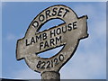 ST8211 : Shillingstone: detail of Lamb House Farm road sign by Chris Downer