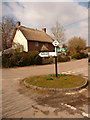 ST7807 : Ibberton: signpost and cottage by Chris Downer