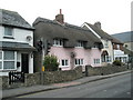 Pink thatched cottage in the High Street