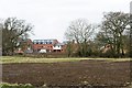 Behind the hoarding at Dukes Meadow