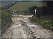 SS5537 : A double bend on the road between Higher Muddiford and Wigley Cross by Roger A Smith