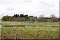 Across the waterlogged field to the Hickstead Hotel