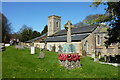 The church of St. Peter and St. Paul, River, and war memorial