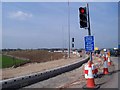 SP2662 : Roadworks, Longbridge island, M40 by David P Howard