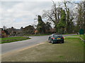 Looking from the access road to the Cowdray Farm Shop towards the Midhurst Road at Easebourne