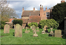 TA1345 : St Michael's Churchyard, Catwick by David Rogers