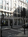 Taxi waiting in Moorgate at the crossroads with London Wall