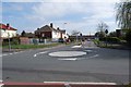 Mini roundabout at junction of Wych Lane and Gregson Avenue