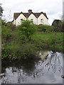 Lyppard Grange pond and pub