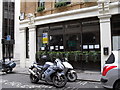 Parked motorcycles in Mitre Street