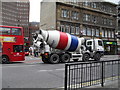 TQ3381 : Cement mixer in Aldgate High Street by Basher Eyre