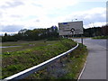 Roadsign on Lower Road approaching the B1002 Roman Road Roundabout