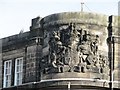 Coat of arms on the corner