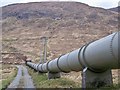 NN2721 : HEP Water Pipeline Crossing Gleann nan Caorann by James T M Towill