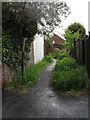 Footpath sign in Cokeham Lane