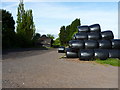 Bales and a Dutch barn at Woodhouse Farm