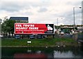 Hoarding on the bank of the Newry Canal near the Dublin Bridge