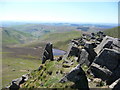SJ0732 : Rocky crag tops above Llyn Lluncaws by Jeremy Bolwell
