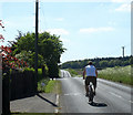ST8941 : 2010 : Cyclist on Deverill Road, Sutton Veny by Maurice Pullin