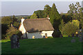 Church Cottage and churchyard, Exbourne