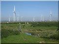 TQ9820 : Sheep and Wind Farm, Romney Marshes by Oast House Archive