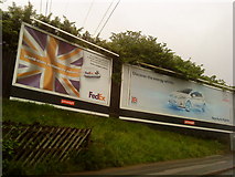 SP0482 : Advertisements near Selly Oak Railway Station by Andrew Abbott