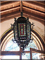 TF6528 : St Peter's church in Wolferton - porch light by Evelyn Simak