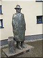 H4472 : Passenger with suitcase sculpture, Omagh by Kenneth  Allen