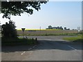 Junction of minor road and the A94 opposite Perth aerodrome