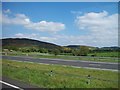 View north-eastwards across the southbound carriage of the A1 near Newtowncloghoge