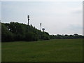 A trio of communications masts near the A23