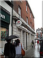 Umbrellas up in Market Place