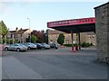 Former garage forecourt in the early morning