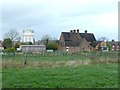 The Cock Inn and a water tower, Hanbury