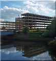 The new Rotherham Metropolitan Borough Council offices reflected in the River Don