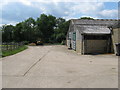 Farm buildings at the end of Hurlands Lane