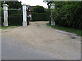 Impressive wrought iron gates at entrance to unknown house