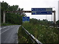 Gantry signs span Rivacre Road and M53