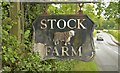 Roadway and sign outside Stock Farm, Ashley, Cheshire