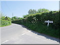 Typical Sussex wooden board signpost, Chalvington, West Sussex