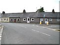 Terraced cottages on the south side of the crossroads at Efailnewydd