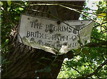 TQ0348 : Battered notice on the Pilgrims' Way by Shazz